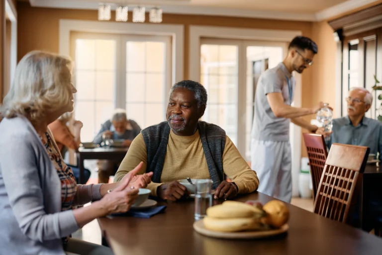 Seniors dining and enjoying the benefits of assisted living