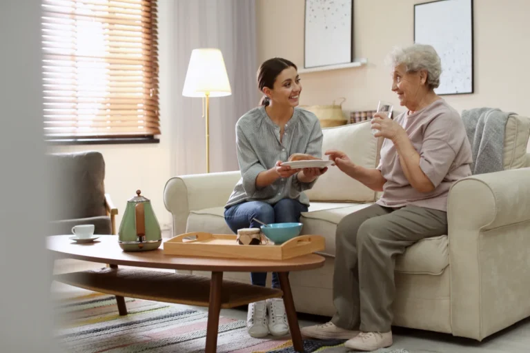 Caregiver helping senior with Activities