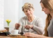 Senior woman and family dementia support