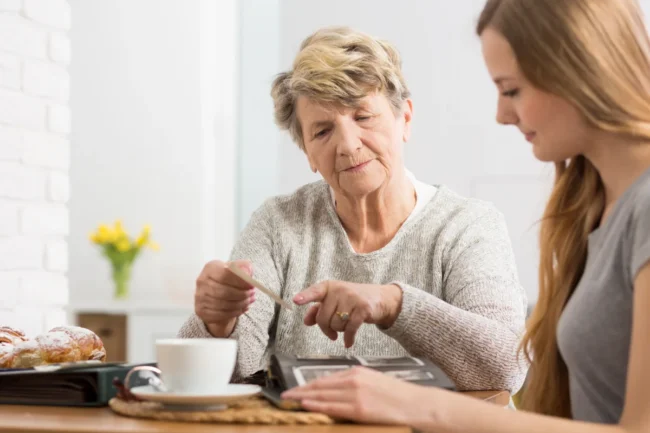 Senior woman and family dementia support