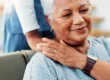 Senior woman being comforted in apartment
