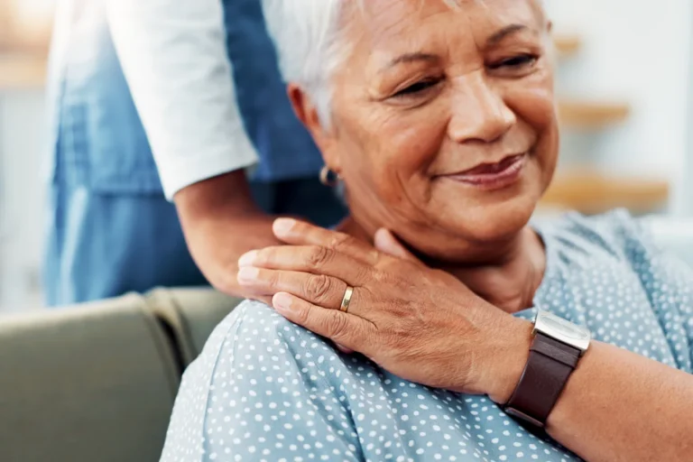 Senior woman being comforted in apartment